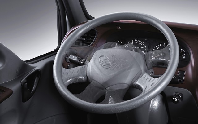 Power and tilt steering wheel